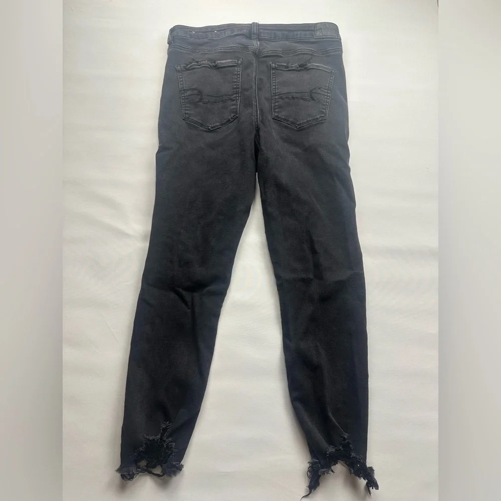 AE Distressed Black Skinny Jeans. Super high waist. Fits size 10-12